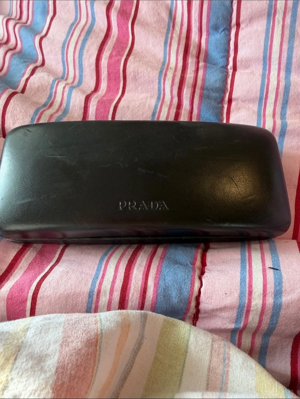 Prada Silver Oval Sunglasses with Brown-Tinted Lenses